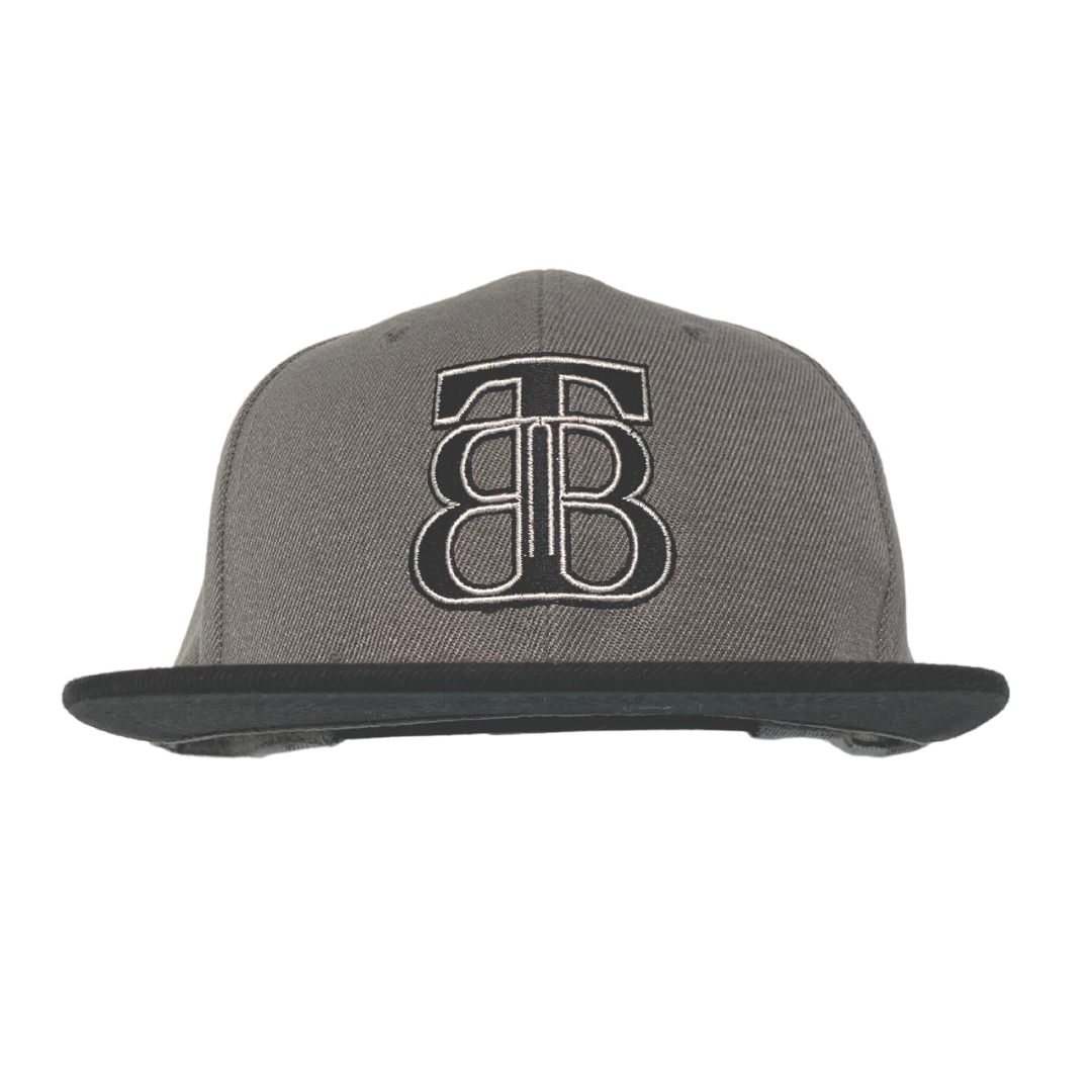 TBB logo flat peak snapback hat