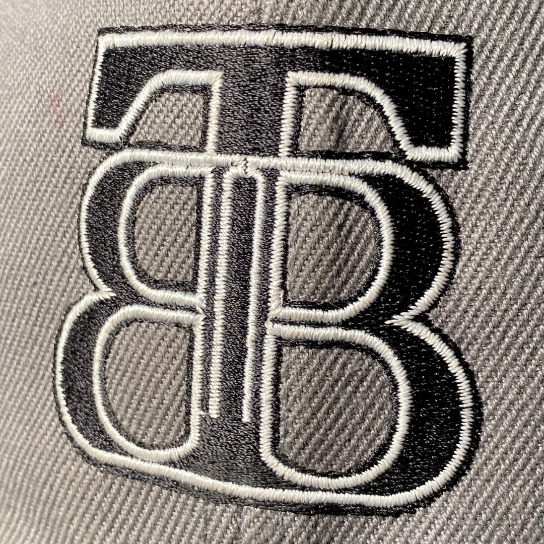 TBB logo flat peak snapback hat